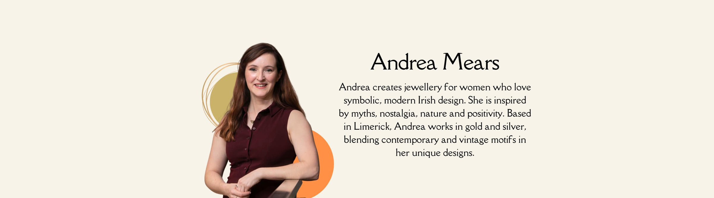 A woman with long brown hair, wearing a sleeveless maroon top, stands with her hands clasped. The background features text about Andrea Mears, a jewelry designer inspired by myths, nostalgia, nature, and positivity, based in Limerick.