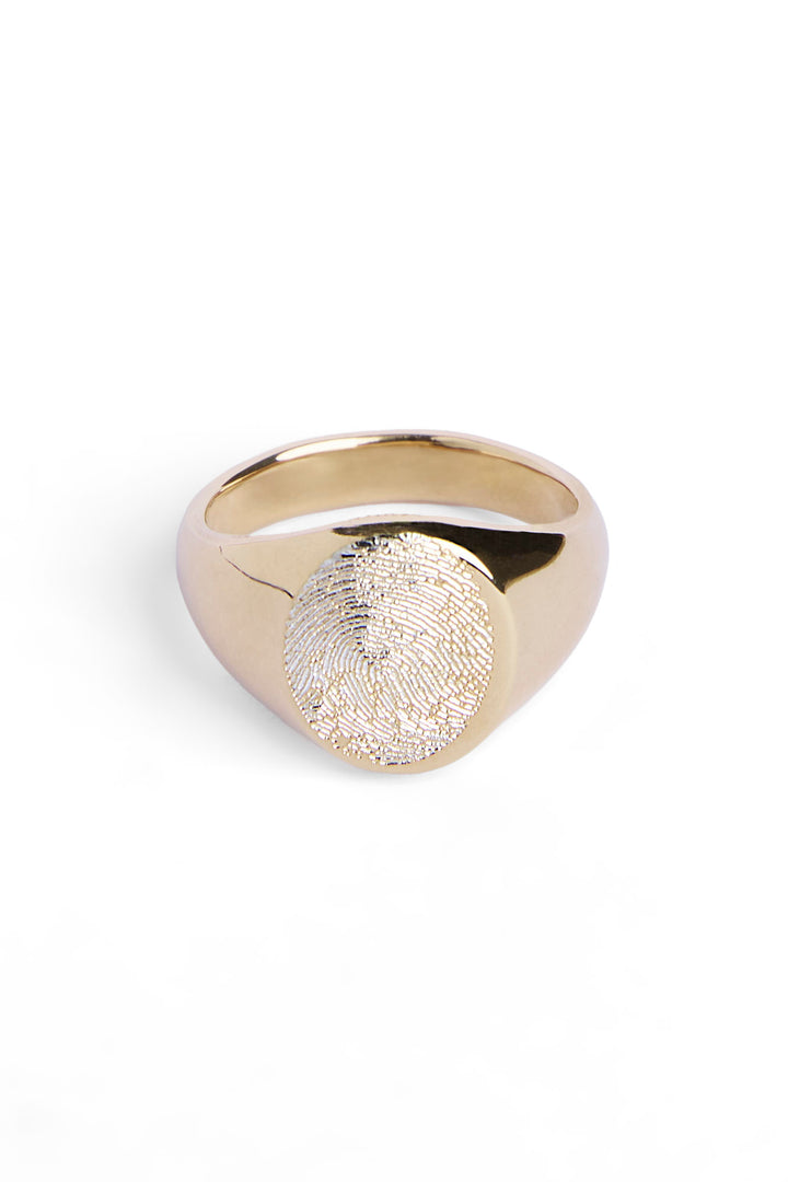 The Engraved Fingerprint Gold Plated Oval Signet Ring by Personalised Charms features a custom fingerprint design—an ideal personalised gift, showcased on a simple white background.