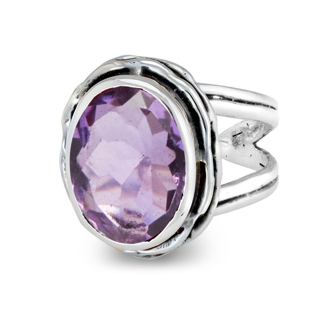 The Magnolia Ring by Gallardo & Blaine Designs features a large oval gemstone in a decorative bezel, double band, and textured sterling silver with silver, gold, and various gemstone options.