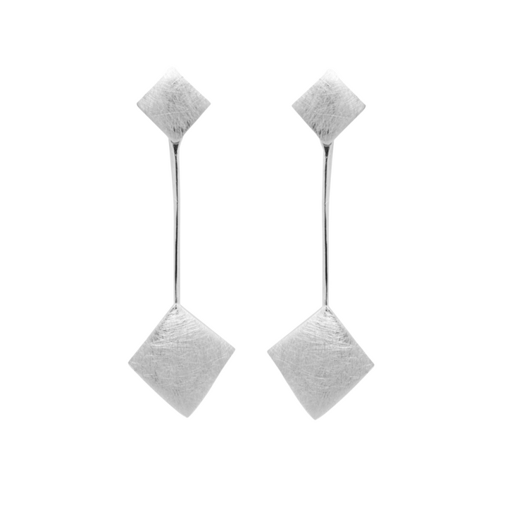 The Art Deco Earrings in Sterling Silver by Gallardo & Blaine Designs feature two diamond-shaped elements linked by a sleek bar and finished with a matte, textured surface for understated elegance.