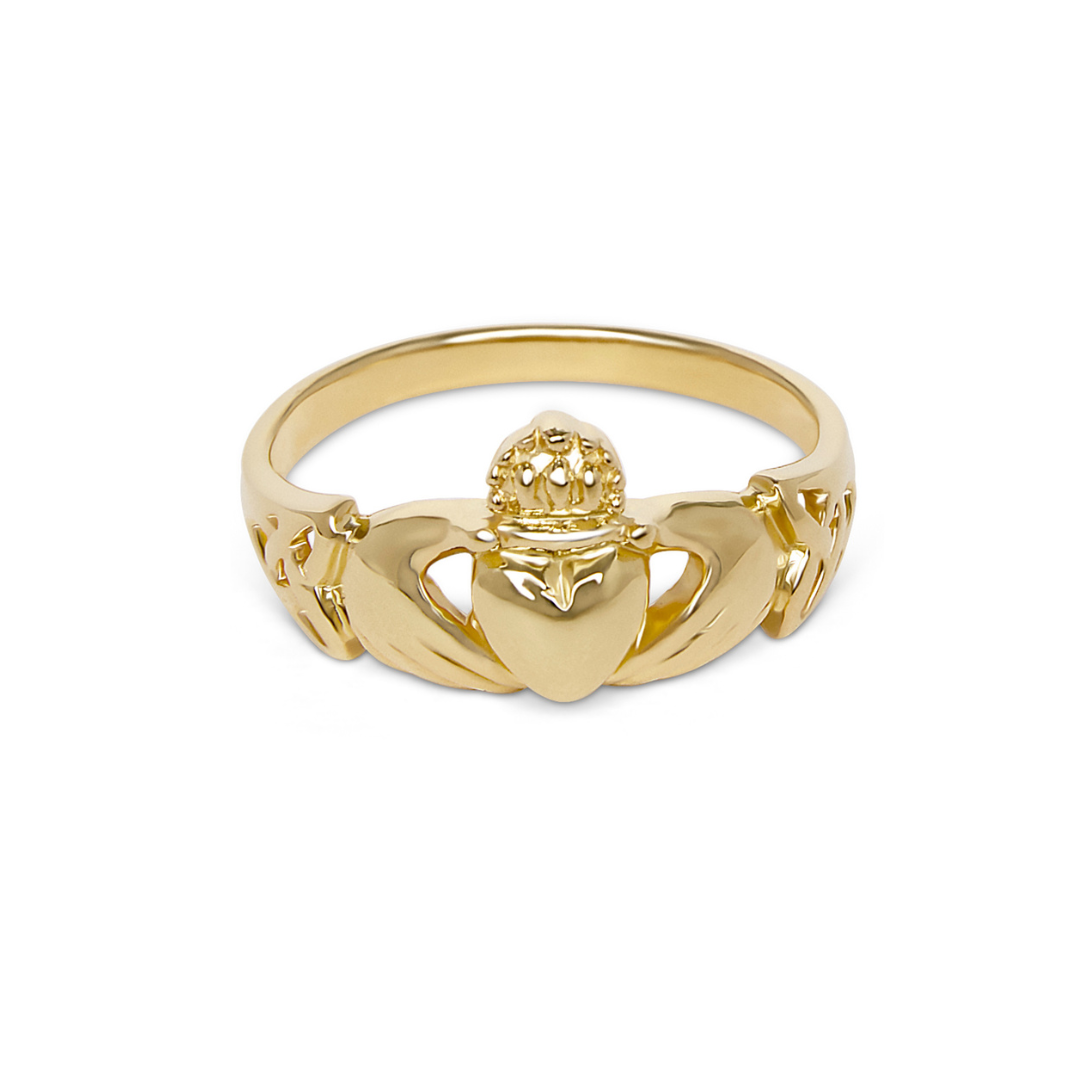 The Claddagh Ring Gold by Watermelon tropical is a gold-plated sterling silver ring featuring two hands holding a crowned heart, symbolizing love, loyalty, and friendship.