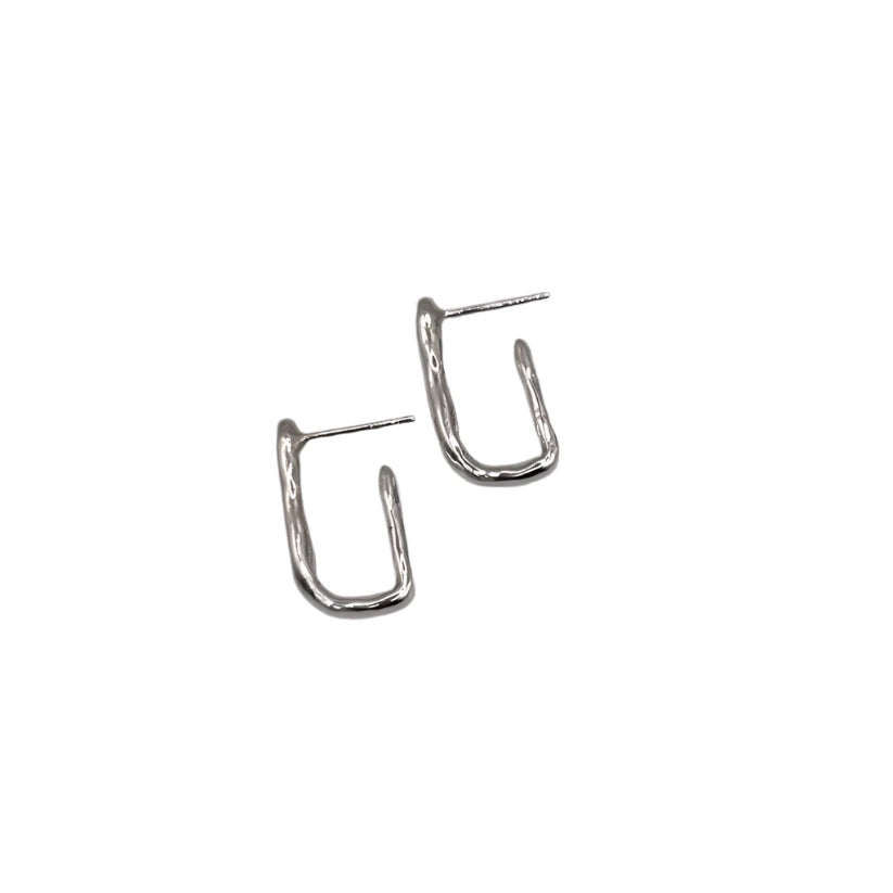 The Inó Jewellery Comfort Square Hoop Earrings are sterling silver, geometric rectangular hoops with a minimalist design, shown on a white background.