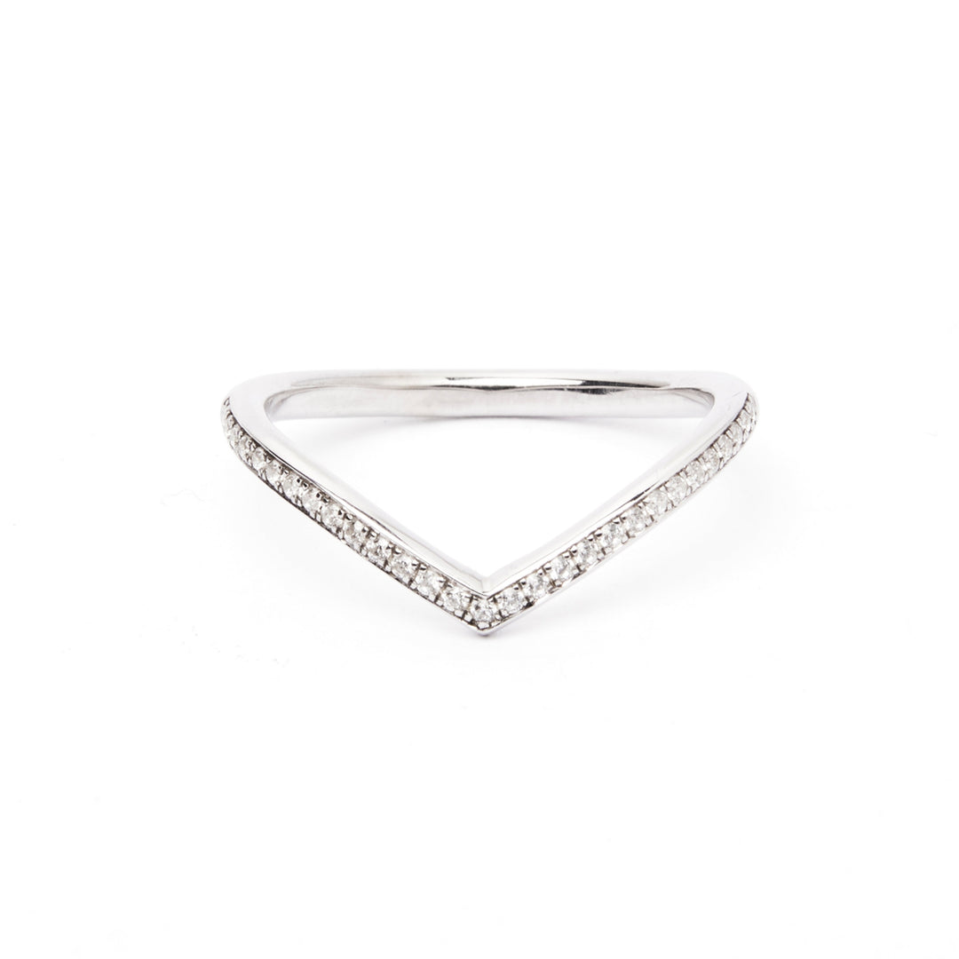 A sleek Wishbone Half Eternity Wedding Ring With Natural Diamonds by The Collective Dublin featuring a row of small, natural diamonds set along the top edge in a pavé style, creating a modern and elegant look against a clean white background.
