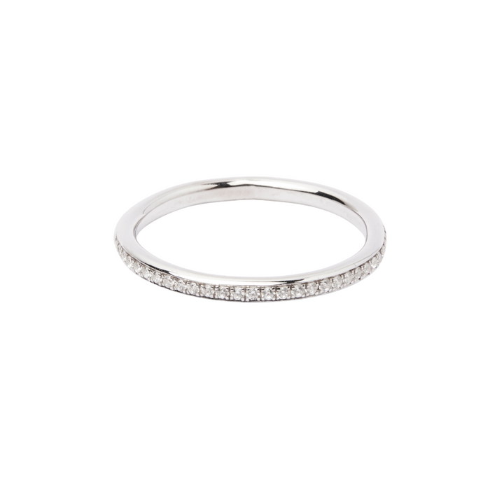 The Collective Dublin Dainty Half Eternity Wedding Ring features lab grown diamonds closely set along the top half of a slim silver band, shown against a white background.