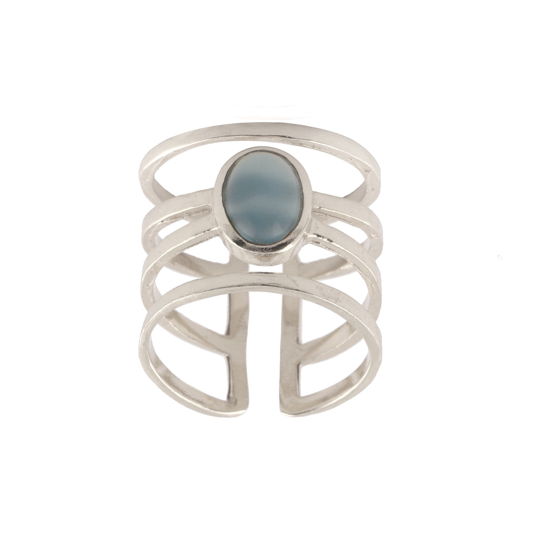 The Andi Banded Ring in Amazonite by Watermelon Tropical features a central oval-shaped Amazonite stone set horizontally. The ring's design includes four thin, sterling silver bands converging at the oval setting, giving it a stylish and contemporary look against a white background.
