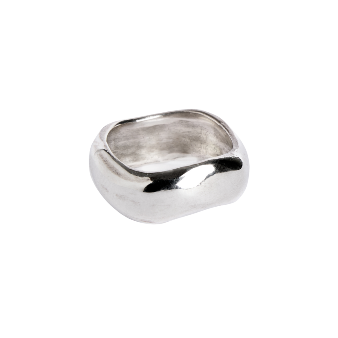The Droplet Sterling Silver Ring by The Collective Dublin features a chunky 925 sterling silver band with smooth, rounded edges and an organic, slightly uneven surface, shown on a white background.