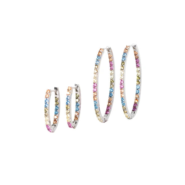 Four exquisite Ellisse Piccolo Oval Hoop Earrings by Sif Jacobs include two small and two large hoops. These gold-plated sterling silver pieces sparkle with cubic zirconia in blue, pink, orange, and green hues, set against a white backdrop in a side-by-side display.