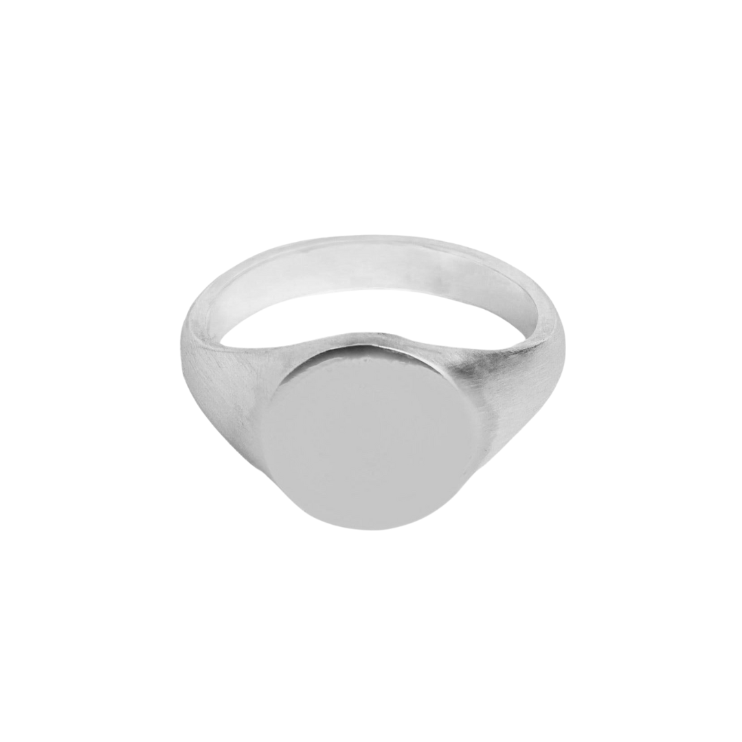 The Engravable Sterling Silver Round Signet Ring by Personalised Charms features a smooth, flat face and is shown against a plain white background.