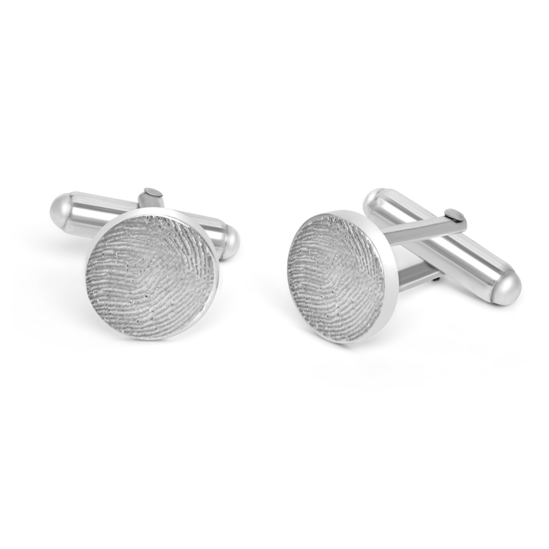 The Engraved Fingerprint Round Cufflinks by Personalised Charms feature round faces, each beautifully engraved with unique fingerprint patterns, adding a sophisticated and personalised touch.