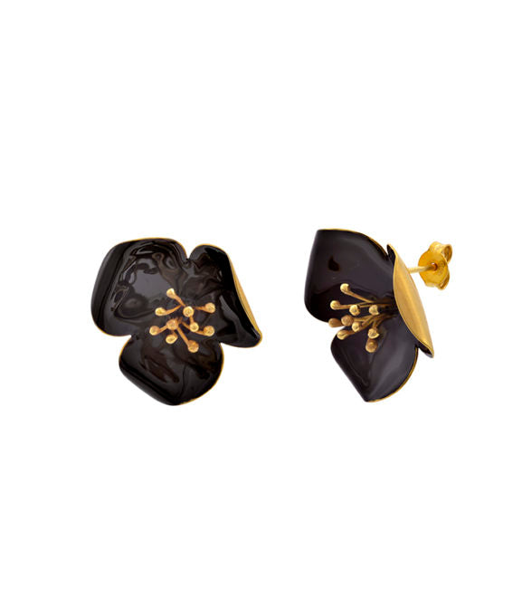 The Gold Enamel Poppy Stud Earrings by Georgia Charal feature glossy black enamel petals and gold-toned stamen details, handcrafted from gold-plated bronze for an elegant floral touch.