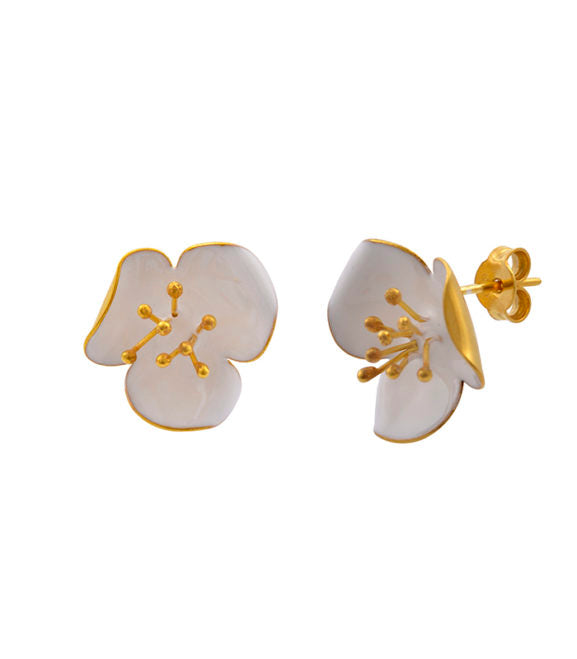 Georgia Charal's Gold Enamel Poppy Stud Earrings feature gold-plated bronze with white, flower-shaped studs and fine enamel details, crafted in Athens with a delicate petal design.