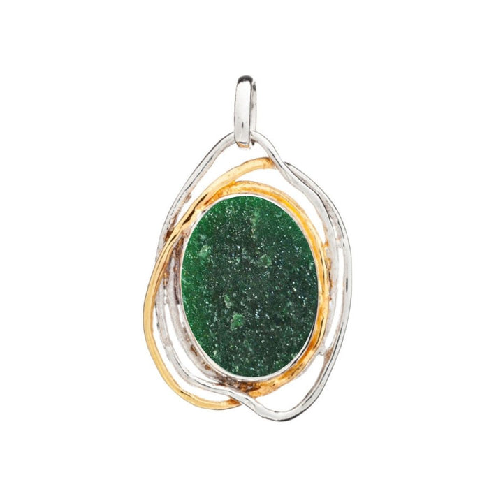 The Cosmos Pendant Large by Gallardo & Blaine Designs showcases a green oval gemstone entwined in silver and gold loops. Its textured, rounded design includes a top loop for chain attachment, making it a stunning statement piece.