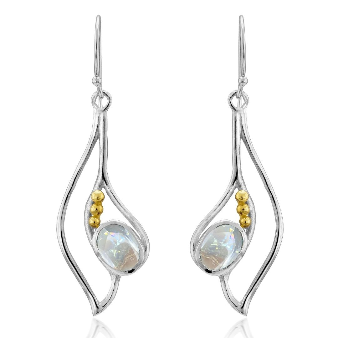 The Iris Earrings by Gallardo & Blaine Designs feature curved silver and gold openwork frames, a round iridescent gemstone, and three small gold beads accenting the side. Available in various gemstones.