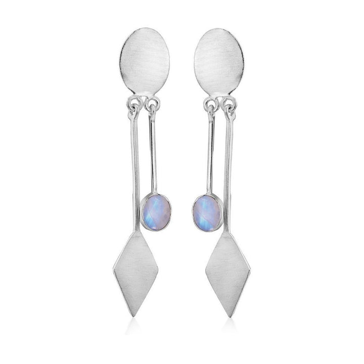 The Karo Earrings by Gallardo & Blaine Designs feature silver oval studs with geometric dangles and iridescent round gemstones, embodying modern elegance.