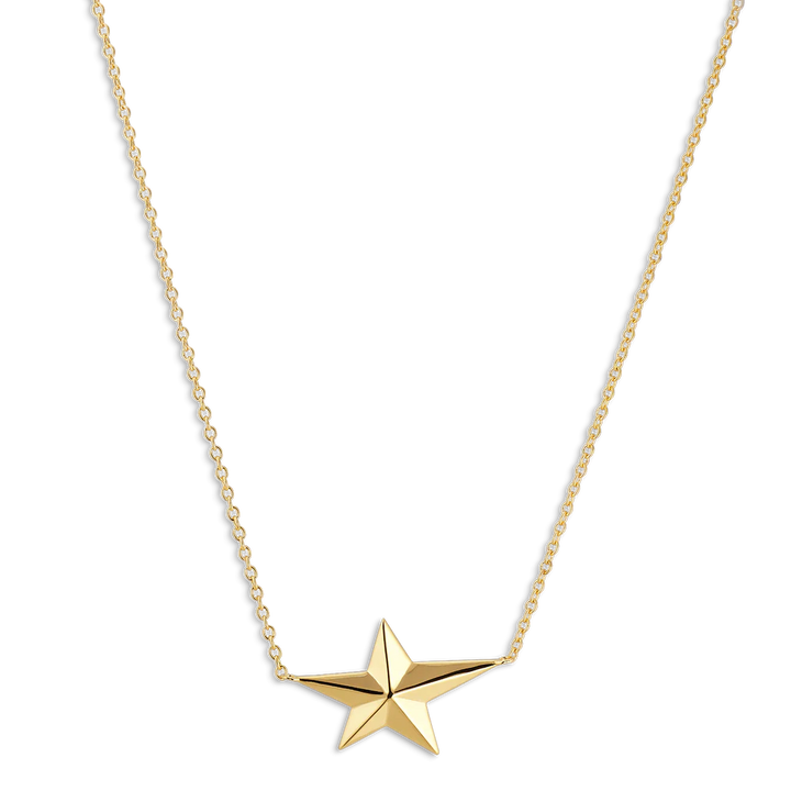 The Night Star Necklace by Jane Koenig features a delicate chain and a shiny five-pointed star pendant, crafted in 18k gold-plated 925 sterling silver and set against a white background.