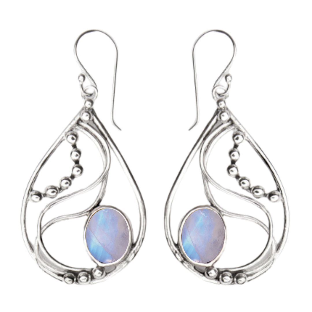 The Phoenix Earrings by Gallardo & Blaine Designs feature sterling silver teardrop dangles with intricate swirls, bead accents, and an oval iridescent gemstone set at the bottom of each earring.