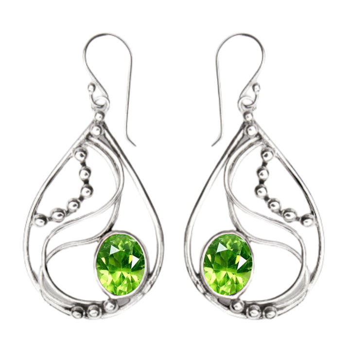 The Phoenix Earrings by Gallardo & Blaine Designs feature sterling silver teardrop shapes with swirl details, bead accents, and a large round green gemstone at the center.