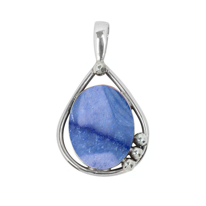 The Poppy Pendant Small by Gallardo & Blaine Designs features an oval sterling silver teardrop frame, a blue gemstone center, and three clustered silver beads at the lower right.