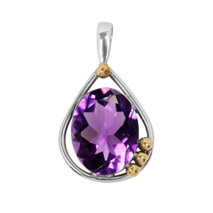 The Poppy Pendant Small by Gallardo & Blaine Designs features a teardrop-shaped sterling silver setting, a large faceted purple gemstone, and three gold bead accents—an elegant piece that stands out.