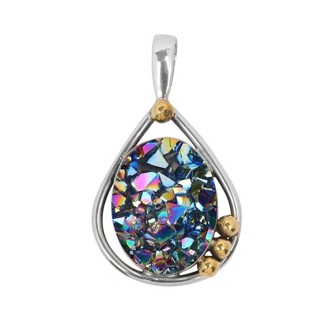 The Poppy Pendant Small by Gallardo & Blaine Designs features a teardrop-shaped multicolored gemstone in a sterling silver and gold frame, accented with three small gold beads on one side.