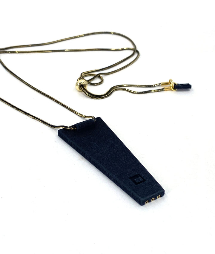The Elsiem Rapture Warrior Necklace features a modern black and gold snake chain with a 3D printed trapezoid pendant and three gold connectors at the bottom, shown on a white background.