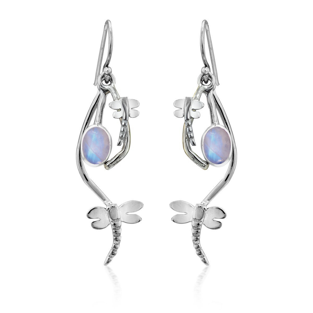 Ripple Earrings by Gallardo & Blaine Designs feature sleek sterling silver dragonflies with oval iridescent gemstones at the center. Modern design, delicate curves, and fine details make these earrings a striking accessory.