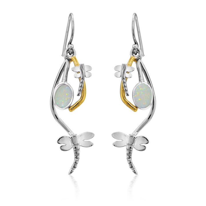 The Ripple Earrings by Gallardo & Blaine Designs feature dragonfly and branch motifs in sterling silver and gold, adorned with oval opal gemstones—blending nature-inspired elegance with timeless style.