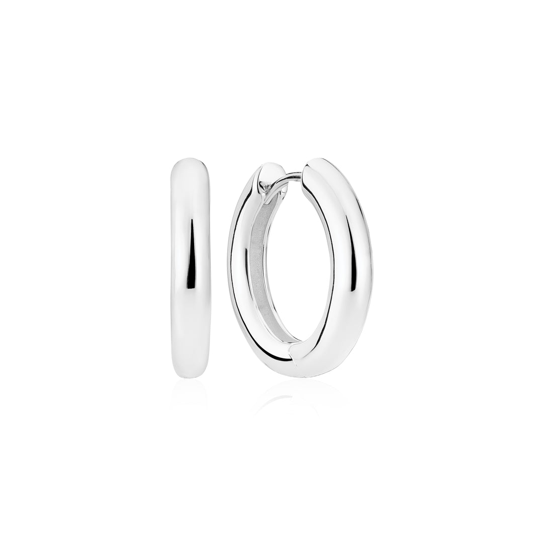 A pair of Sif Jacobs Carrara Pianura sterling silver earrings is displayed against a white background, with one hoop shown from the front and the other from the side.