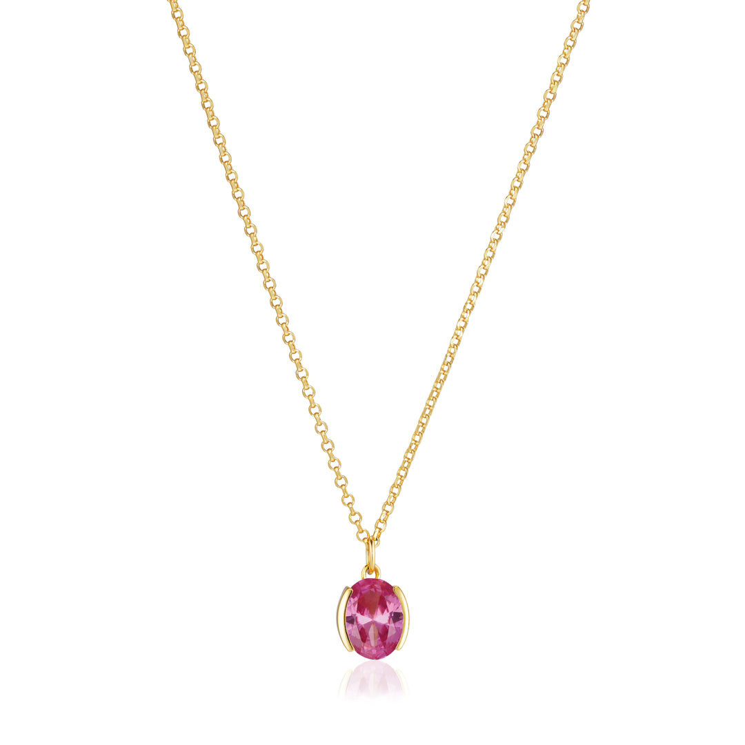 The Sif Jacobs Ellisse Carezza Necklace is an 18k gold plated piece with a petite oval pink gemstone pendant in a simple gold bezel, shown on a white background.