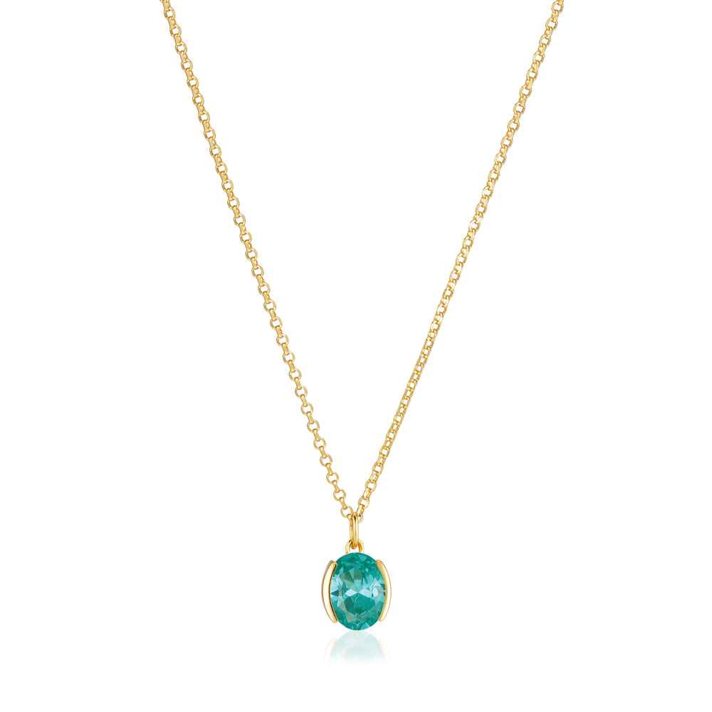 The Ellisse Carezza Necklace by Sif Jacobs features an oval blue-green gemstone pendant on an 18 karat gold plated chain, displayed against a white background.