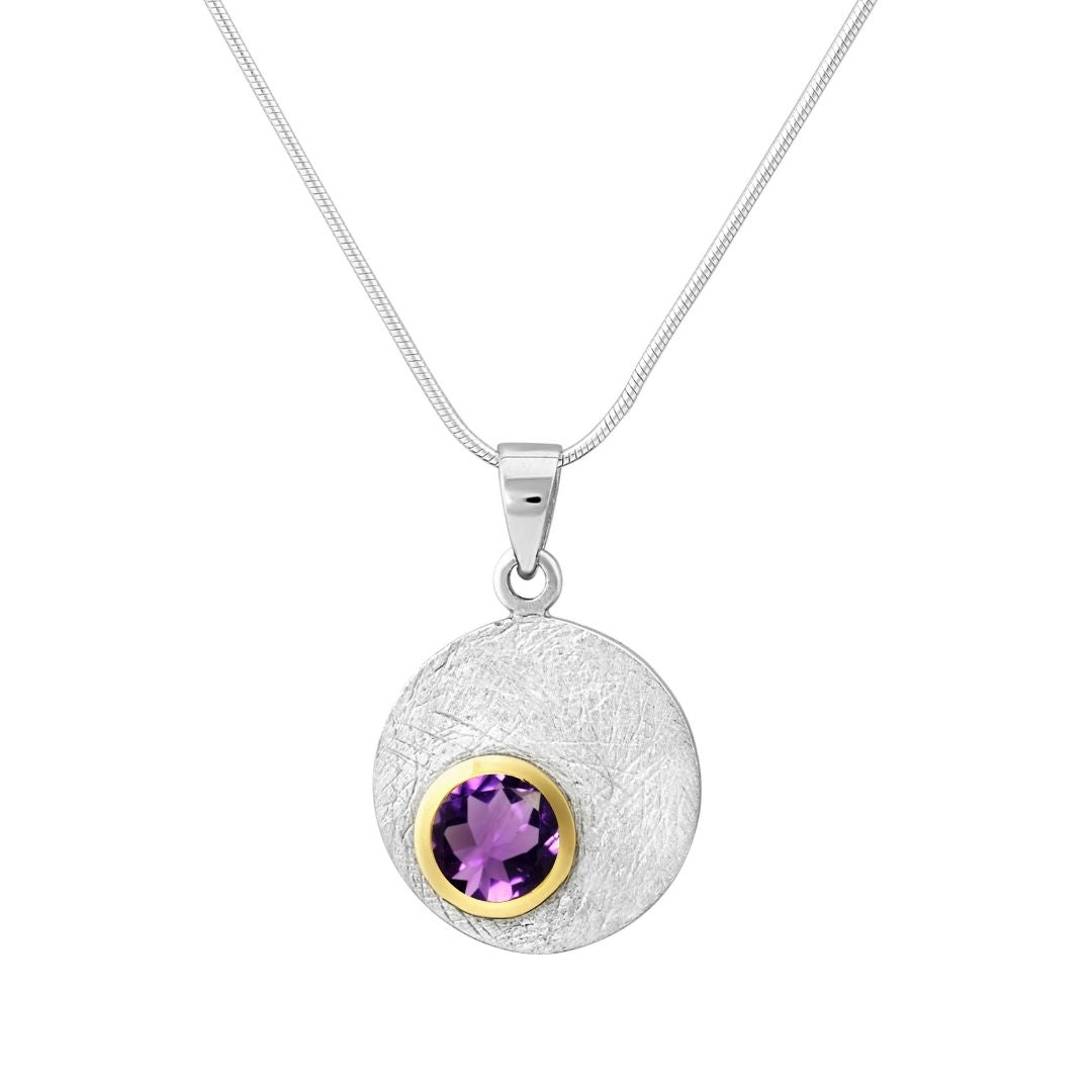 The Selene Necklace Silver - Small by Gallardo & Blaine Designs features a textured sterling silver round pendant with your choice of gemstone in a gold bezel—an elegant, personalized touch to elevate any look.