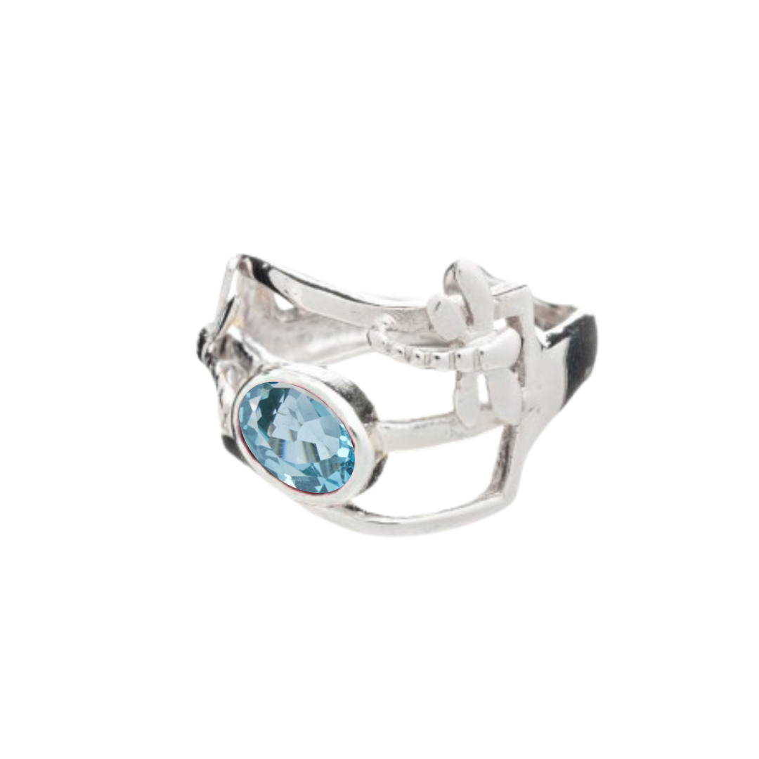 The Small Dragonfly Ring by Gallardo & Blaine Designs features an artistic open band, gold and silver plating, and a striking oval blue gemstone—an elegant choice for gemstone jewelry lovers.