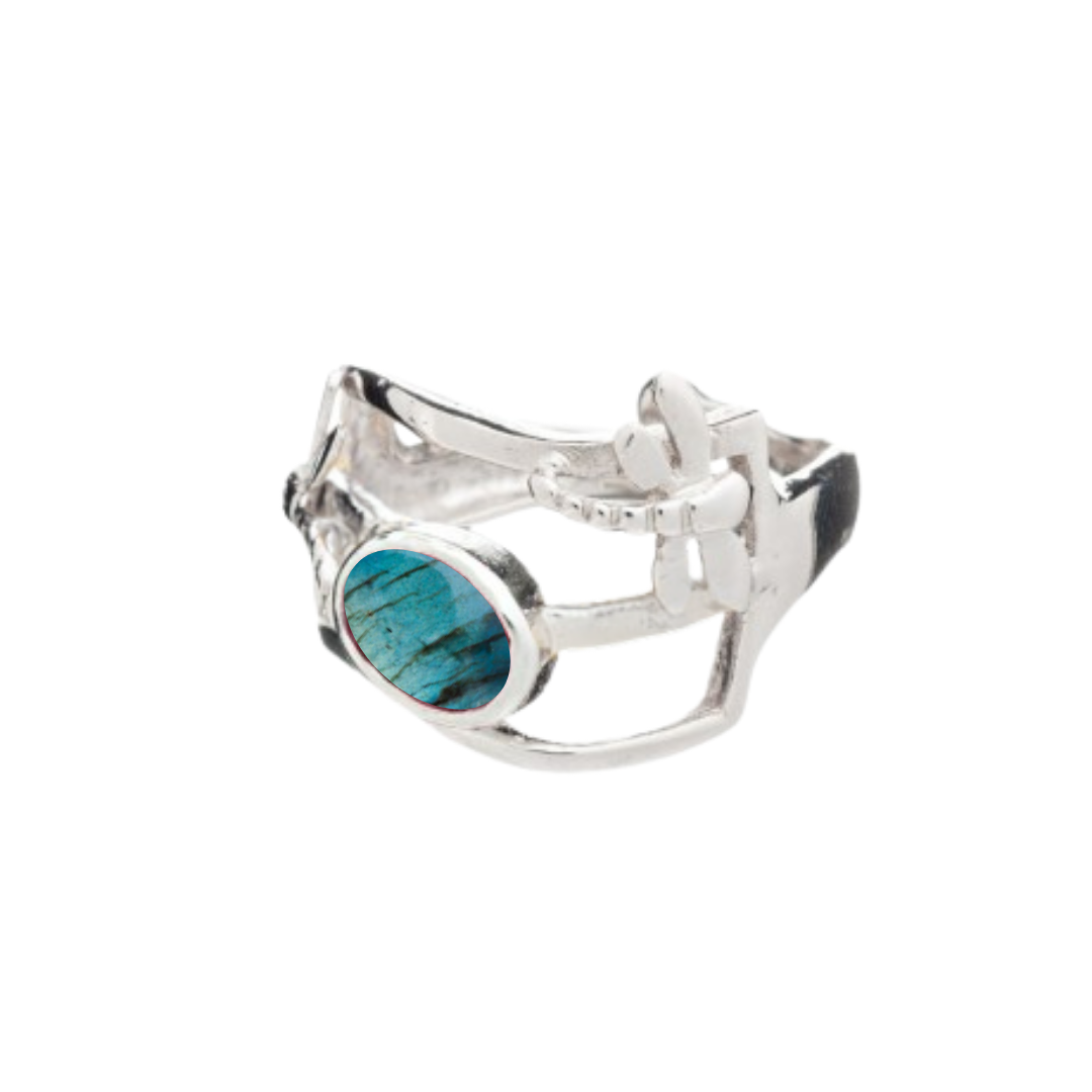 The Small Dragonfly Ring by Gallardo & Blaine Designs features an open silver band with a small oval turquoise stone on one side, creating a unique gemstone jewelry piece elegantly showcased on a white background.