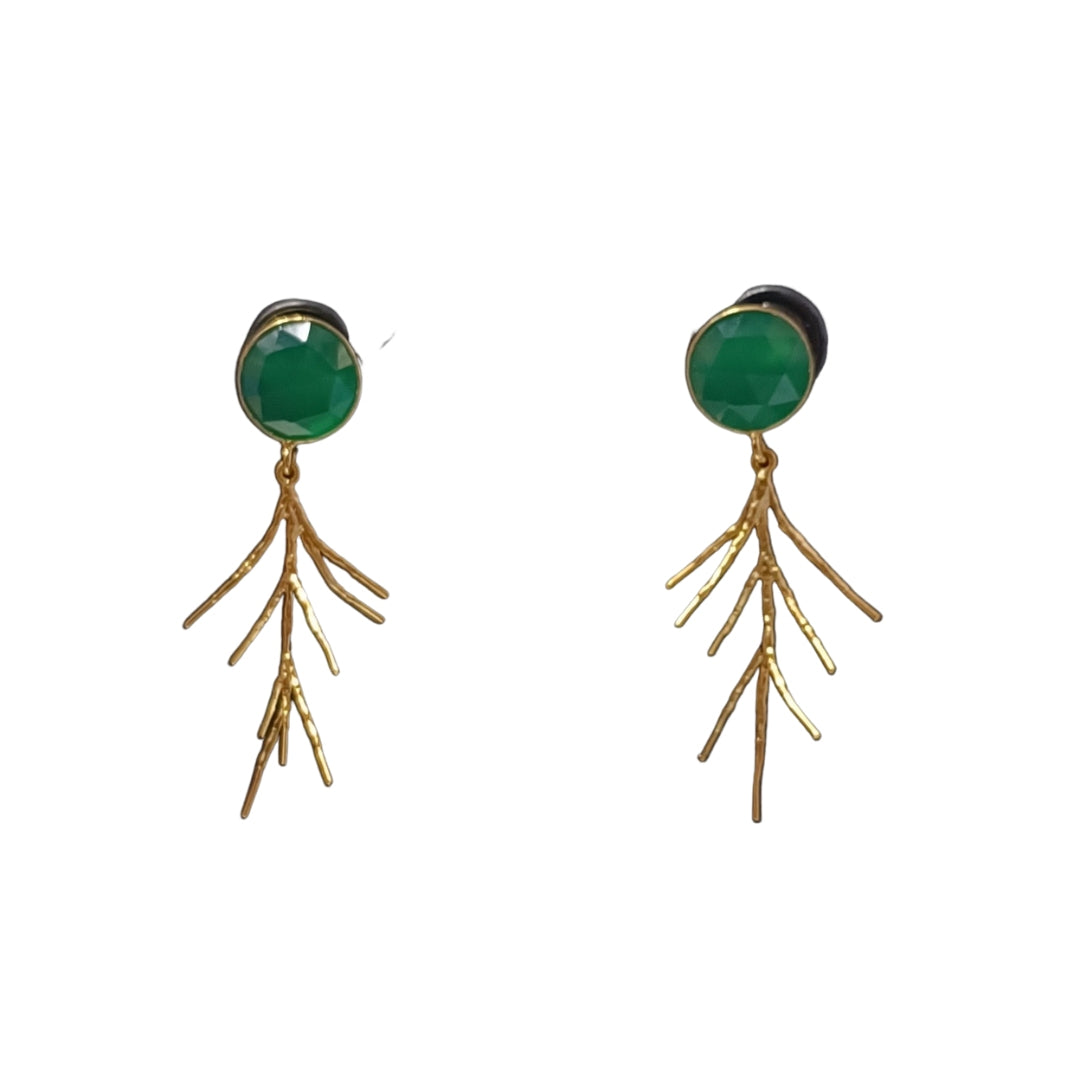 A pair of Meadow Earrings by Aria V featuring round green gemstones at the top, each set in a gold-toned bezel. Dangling from each gemstone are delicate, 16k gold electroplated brass designs that resemble twigs or branches.