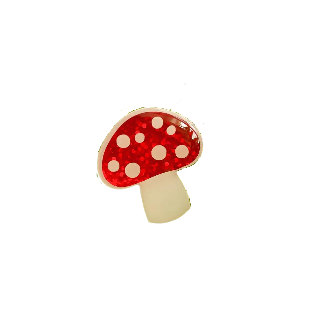 A small **Naoi Mushroom Pin Brooch** with a red cap and white spots. The stem is white, and the overall design is stylized and colorful, perfect for resin surfaces. The background is transparent.