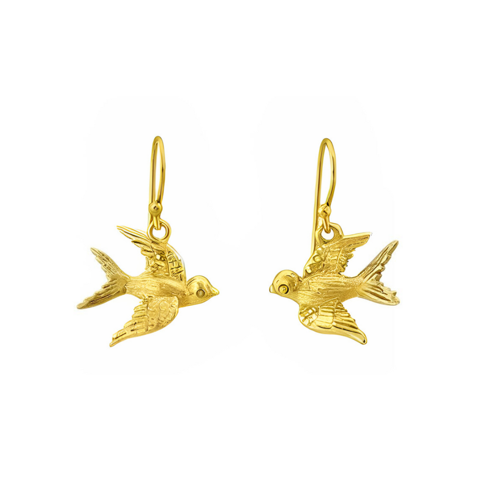 Gallardo & Blaine Designs' Wildlife Swallow Dangle Earrings in gold, shaped like flying birds with detailed feathers, from the Wildlife Collection, are shown on a white background.