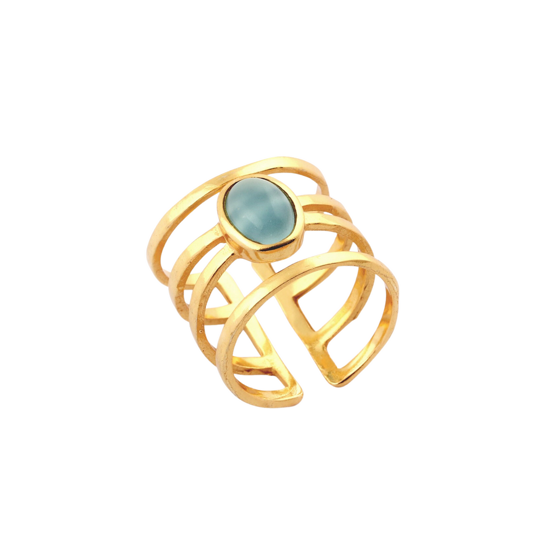 Introducing the Andi Banded Ring in Amazonite by Watermelon Tropical. This elegant, modern piece features an open band design with several horizontal bars connected to two vertical bars, all meticulously gold-plated. At its center lies a captivating oval-shaped Amazonite stone, beautifully set in a gold bezel.