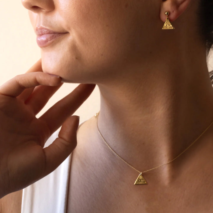 eye of protection gold plated necklace on model