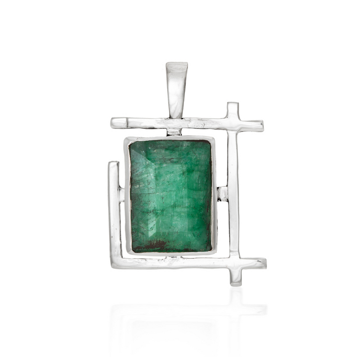 The Art Deco Pendant by Gallardo & Blaine Designs features a rectangular green gemstone set in a modern sterling silver design with geometric, intersecting lines, shown on a white background.