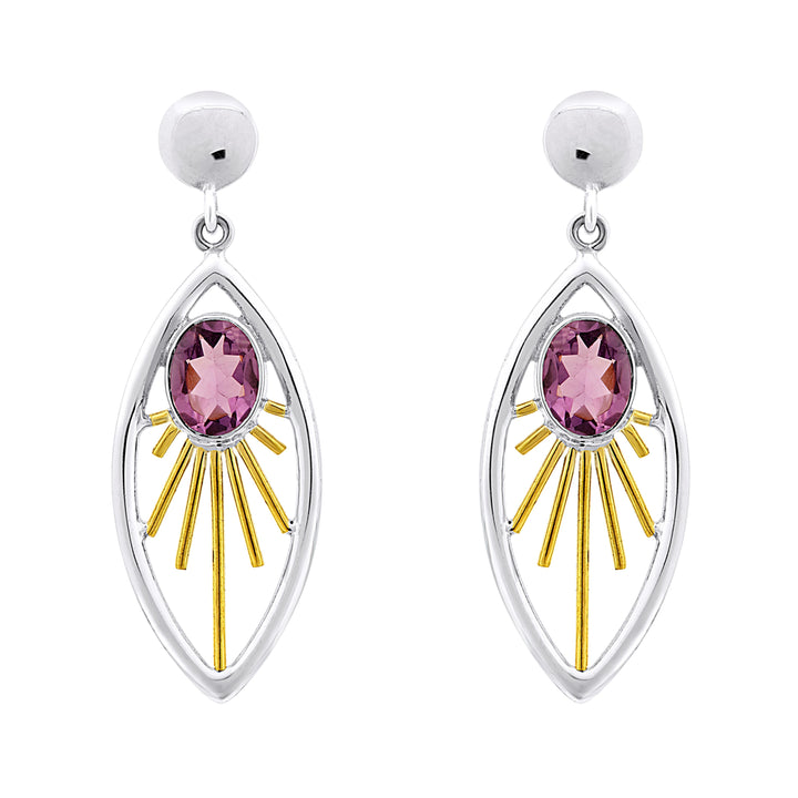 A pair of elegant Goddess Earrings in various gemstones featuring an oval-shaped pink gemstone at the center. The gemstone is set within a sterling silver & gold frame adorned with rays extending outward, resembling a radiant sunburst. These exquisite gemstone drop earrings are attached to small, round silver studs by Gallardo & Blaine Designs.