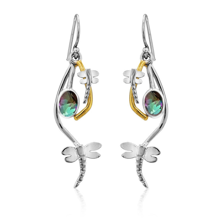 A pair of delicate Ripple Earrings in various gemstones by Gallardo & Blaine Designs, with a dragonfly theme, adorned with multi-colored gemstones and gold accents. The long, curving design showcases a dragonfly perched gracefully and a shimmering oval gemstone at the center of each earring for an elegant touch.