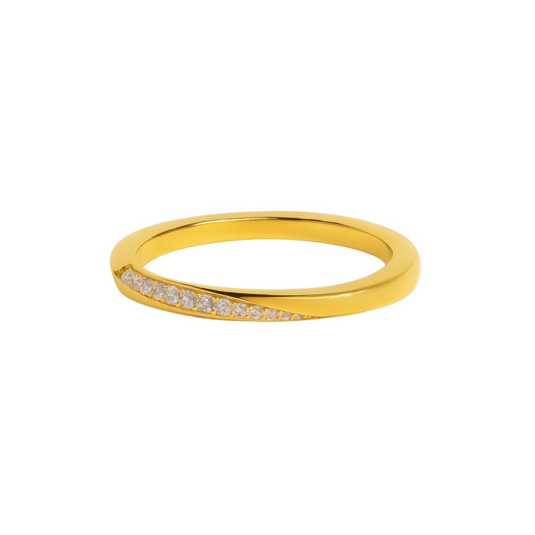 The Collective Dublin’s 2mm Square Twist Band features a slim 9ct yellow gold design with lab grown diamonds set diagonally along one side, shown on a plain white background.