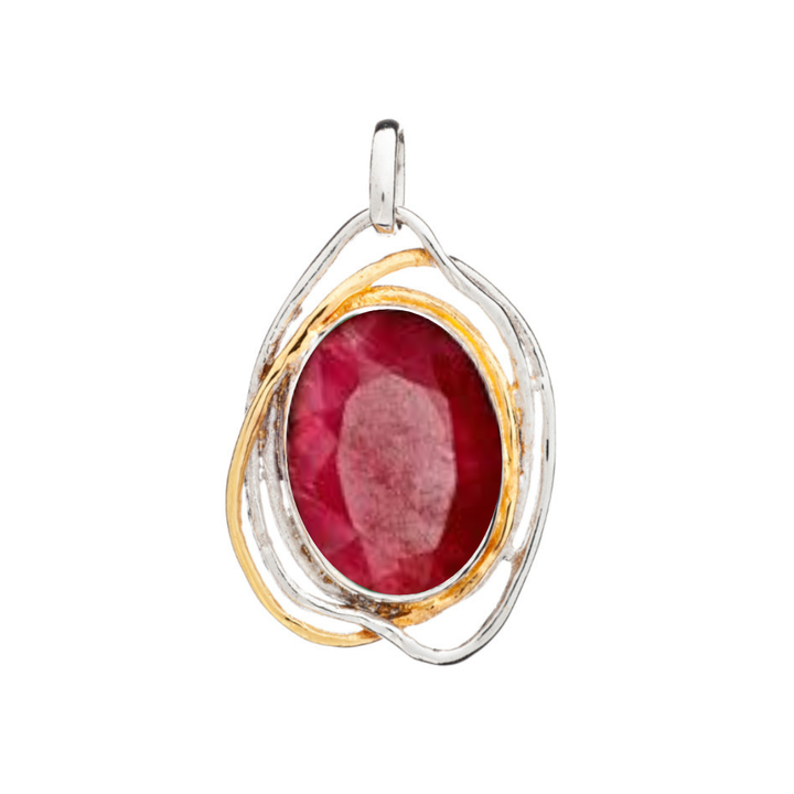 Discover the Cosmos Pendant Large by Gallardo & Blaine Designs: a striking piece with an oval red gemstone encased in an interwoven silver and gold metal frame.