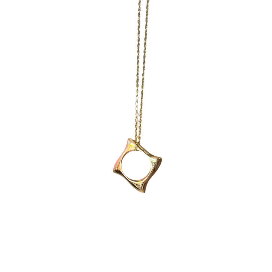 The Waves Necklace Gold by Andrea Mears Jewellery features an 18ct gold plated, abstract open square pendant on a delicate chain—perfect for ocean-inspired jewelry lovers. Shown against a white background.
