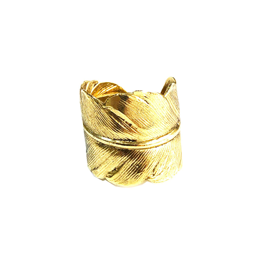 A Mabelle Feather Ring Gold by Lotta et Djossou, featuring a textured design resembling intertwined leaves, giving it a nature-inspired and elegant appearance. The ring has a wide band with detailed engravings to mimic the look of actual foliage.