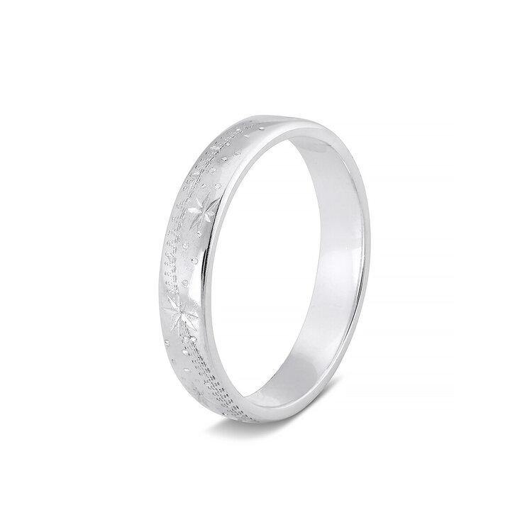 A sterling silver ring with a polished finish, this **Shooting Star Silver Slim Ring** by **Cosmic Boulevard** features delicate shooting star engravings around its exterior, offering a subtle yet elegant design. The plain white background highlights the simplicity and beauty of the ring.