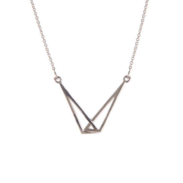 A Miriam Wade Le Cheile Pendant Small Silver featuring a geometric pendant with two overlapping, open triangles, suspended from a delicate chain. The design is minimalistic and modern, perfect for those who appreciate dainty jewellery.