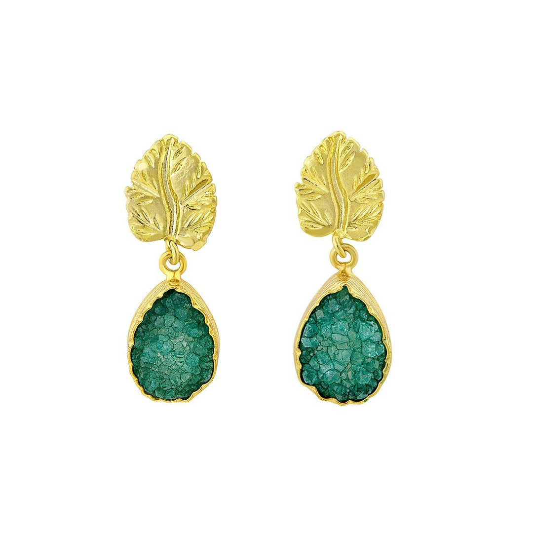 A pair of Green Druzy And Gold Leaf Earrings by Watermelon Tropical. The stones have a textured, crystalline appearance, and the gold metal settings feature detailed leaf designs.