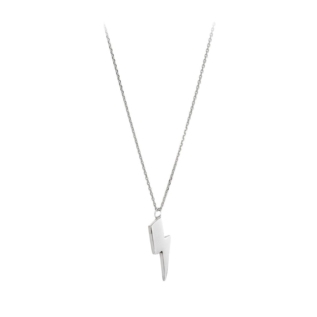 A delicate Sterling Silver jewelry piece, this minimalist necklace features an angular lightning bolt pendant. The Bowie Lightning Bolt Necklace Silver by Cosmic Boulevard is displayed against a white background, showcasing its simple yet elegant design.