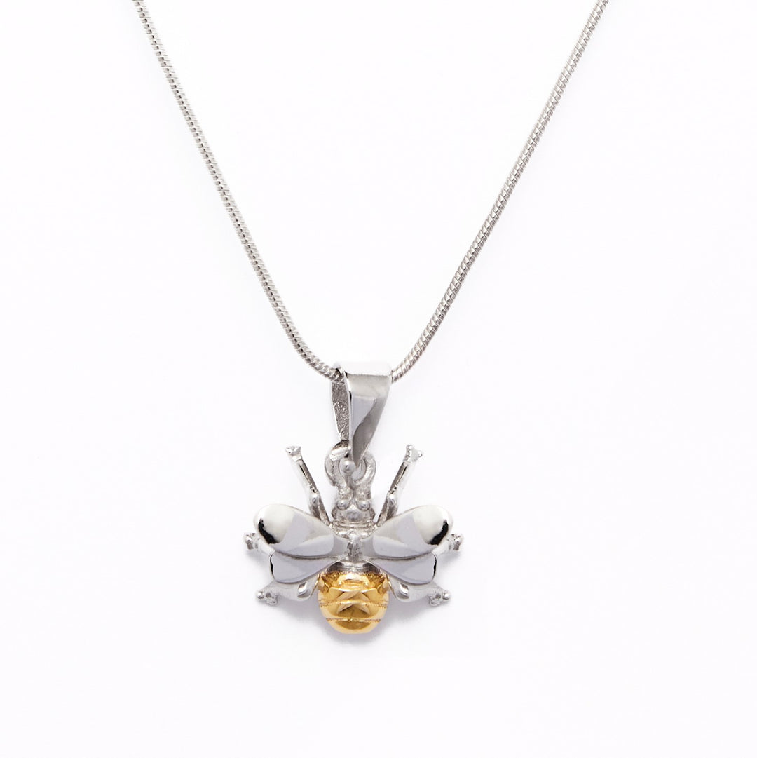A Gallardo & Blaine Designs Wildlife Pendant - Small Bee With Chain features a bee pendant with intricate silver wings and legs, complemented by a gold-plated, textured body. The delicate chain enhances the pendant's detailed design against a plain white background.